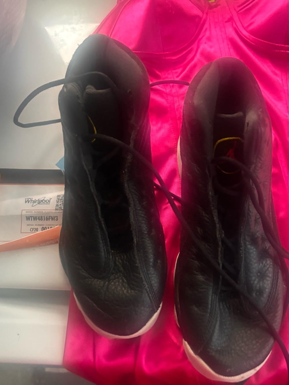 Jordan Women's Black Leather High-Top Sneakers with White Soles